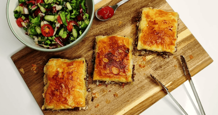 crispy meat pastry (egyptian goulash) with salad