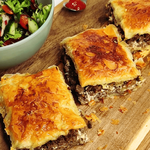 crispy meat pastry (egyptian goulash) with salad